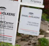Real estate signage showing homes for rent and sale is seen on Monday, May 15, 2023 in Montreal. Christinne Muschi/The Canadian Press. 