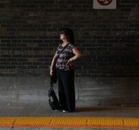 A woman stands on an empty platform at Toronto's Union Station  on Tuesday  October 3, 2023. Chris Young/The Canadian Press. 