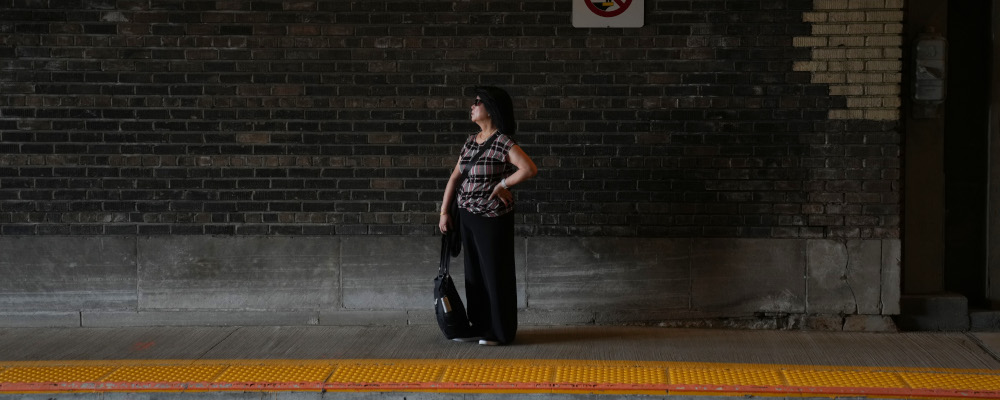 A woman stands on an empty platform at Toronto's Union Station  on Tuesday  October 3, 2023. Chris Young/The Canadian Press. 