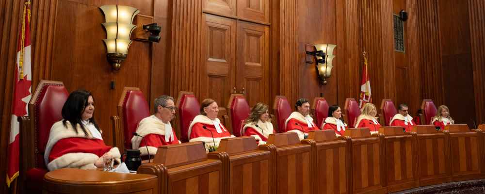 Supreme Court of Canada Justices are seen during a welcome ceremony at the Supreme Court, in Ottawa, Monday, Feb. 19, 2024. Adrian Wyld/The Canadian Press. 