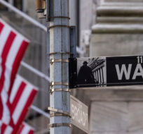 Wall Street sign is seen outside the New York Stock Exchange,  Thursday, March. 21, 2024. Yuki Iwamura/AP Photo. 