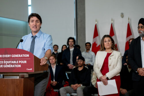 Justin Trudeau, left, speaks during a news conference with Chrystia Freeland and Harjit S. Sajjan in Vancouver, Wednesday, March 27, 2024. Ethan Cairns/The Canadian Press. 