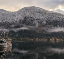 Snow blankets the mountains over the village of Zeballos, B.C., is located along the northwest coast of Vancouver Island is shown on April 3, 2024. Chad Hipolito/The Canadian Press.