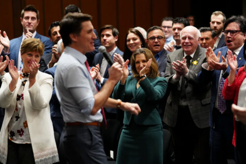 Chrystia Freeland applauds as Justin Trudeau delivers a speech to his caucus on Parliament Hill  in Ottawa on Wednesday, April 17, 2024. Sean Kilpatrick/The Canadian Press. 