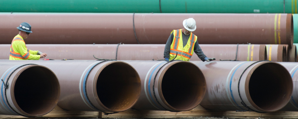 Pipeline pipes are seen at a Trans Mountain facility near Hope, B.C., Thursday, Aug. 22, 2019. Jonathan Hayward/The Canadian Press. 