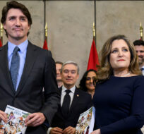 Prime Minister Justin Trudeau, Deputy Prime Minister and Minister of Finance Chrystia Freeland and cabinet ministers pose for a photo before the tabling of the federal budget on Parliament Hill in Ottawa, on Tuesday, April 16, 2024. Justin Tang/THE CANADIAN PRESS