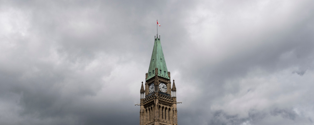 Storm clouds pass by the Peace tower and Parliament Hill Tuesday August 18, 2020 in Ottawa. Adrian Wyld/The Canadian Press. 