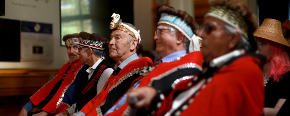 Haida Nation Hereditary Chiefs look on during a ceremony about recognizing the Aboriginal title throughout Haida Gwaii while in the legislature, in Victoria, Monday, April 22, 2024. Chad Hipolito/The Canadian Press. 