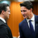 Prime Minister Justin Trudeau and Conservative leader Pierre Poilievre greet each other as they gather in the House of Commons on Parliament Hill to pay tribute to Queen Elizabeth in Ottawa on Thursday, Sept. 15, 2022. Sean Kilpatrick/The Canadian Press. 